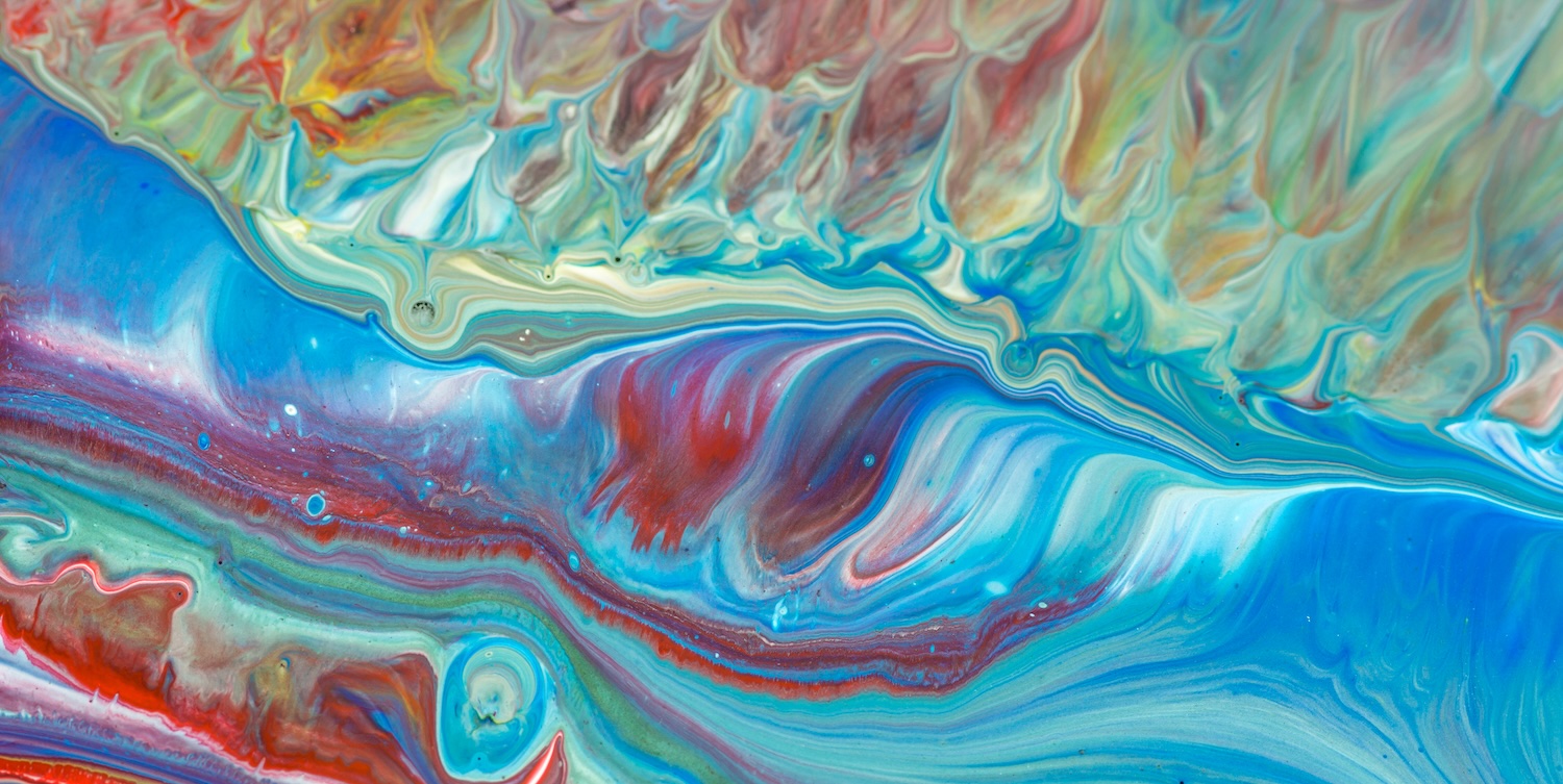 Abstract fluid painting in teal, blue, and red representing the layered emotional patterns beneath relationship communication- Kim Ronan Los Angeles Couples Therapist